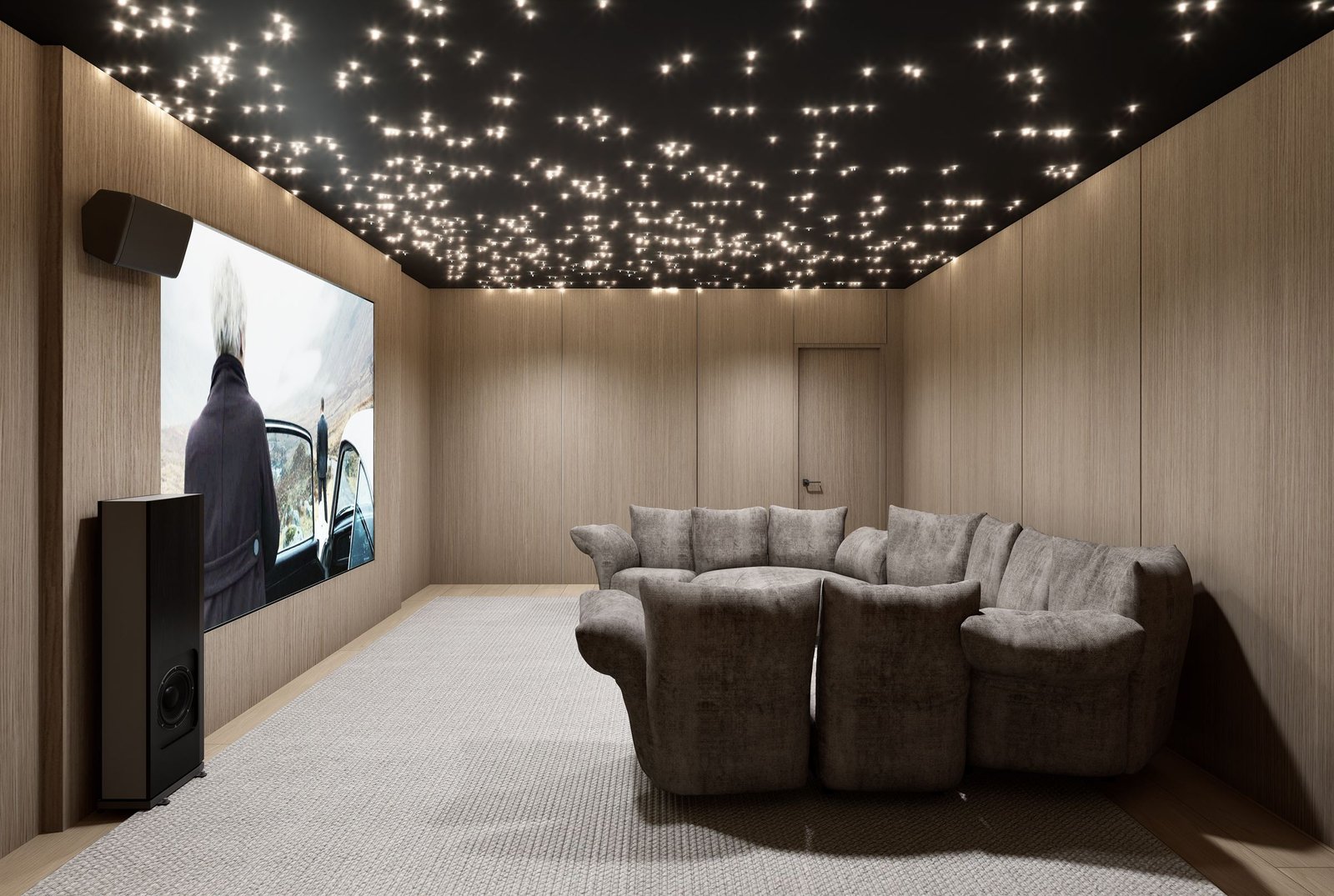 Home theater paneled in oak with a projection screen, floor-standing speakers and a fiber-optic star ceiling