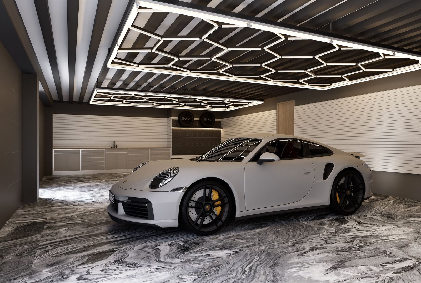 Garage with a hexagonal LED ceiling grid, a reflective floor and a sports car